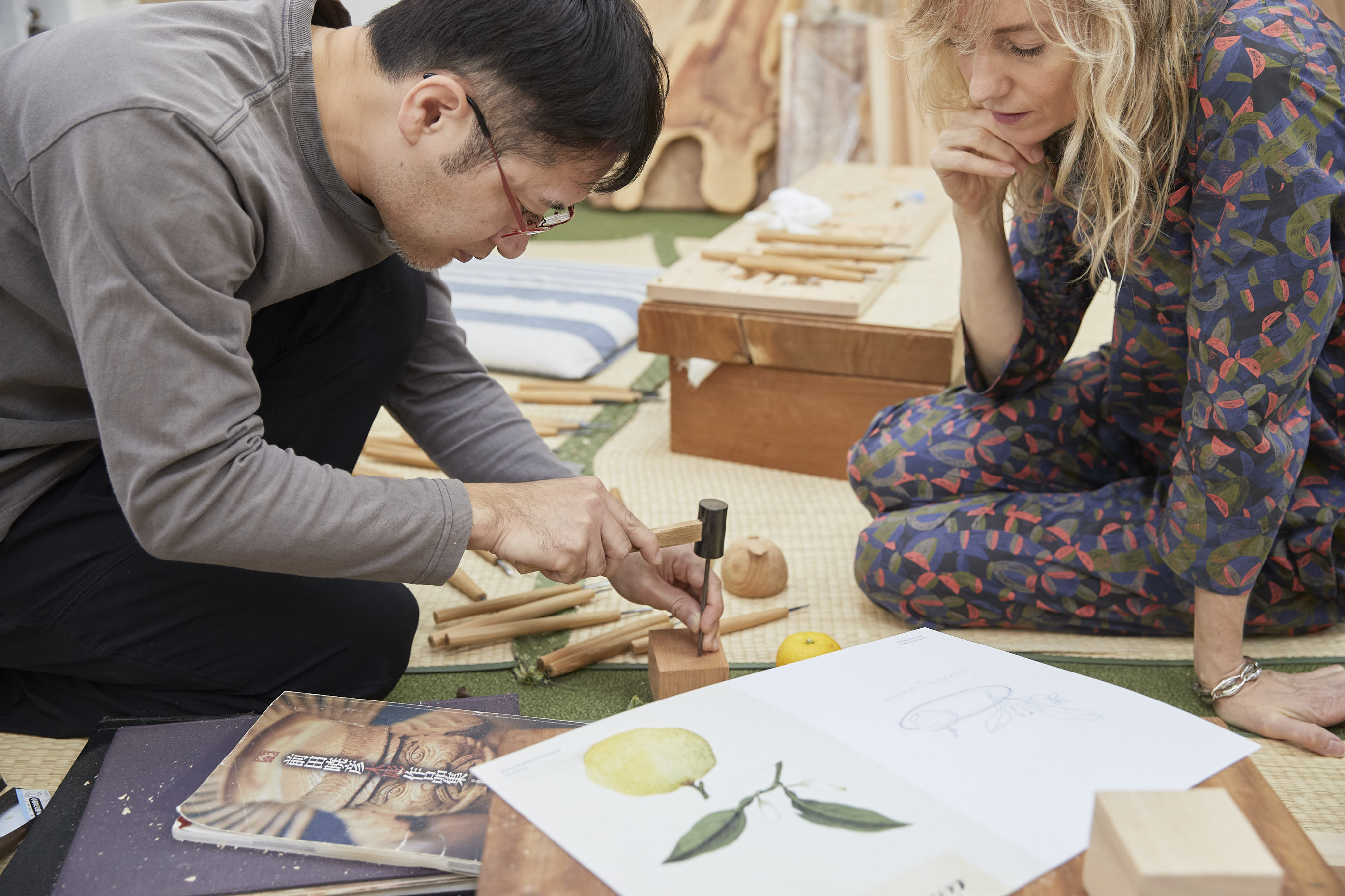 Carole Baijings and Akihiko Maeda working in Osaka on Wooden Narratives