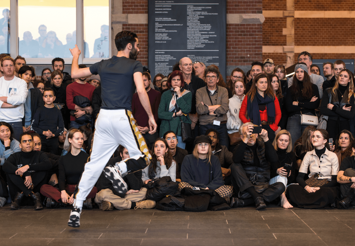Performance of dancer with large audience