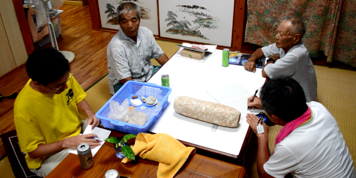 Randall Sasaki (Kyushu National Museum, front left), and Professor Ikeda (Ryukyu University, front right), interviewing members of the local community on Tarama Island, Japan, 2016 (photo: RCE) Randall Sasaki (Kyushu National Museum, front left), and Professor Ikeda (Ryukyu University, front right), interviewing members of the local community on Tarama Island, Japan, 2016 (photo: RCE)