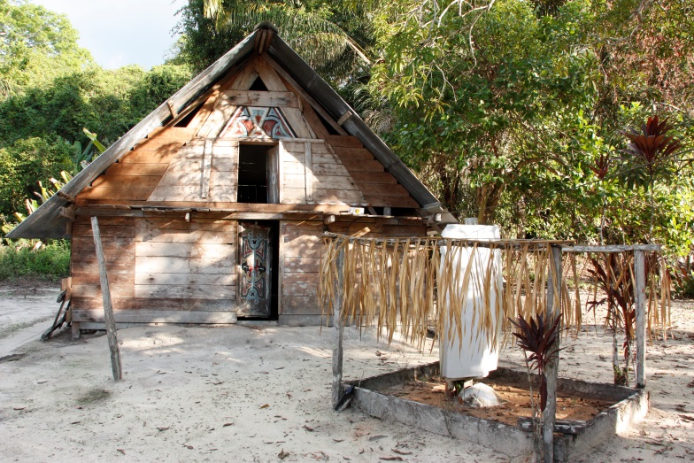 Wooden house in the Marroon village of Dritabiki