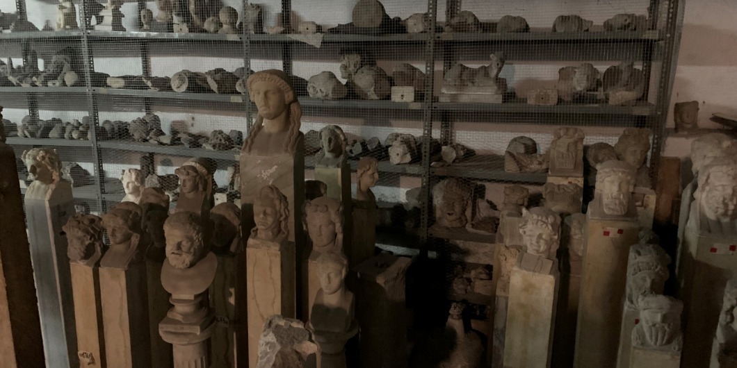 Various sculptures in a storage room