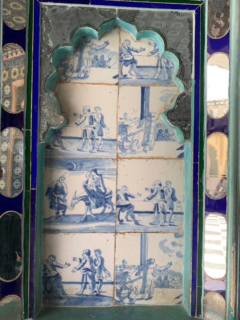 Blue and white tiles on a wall