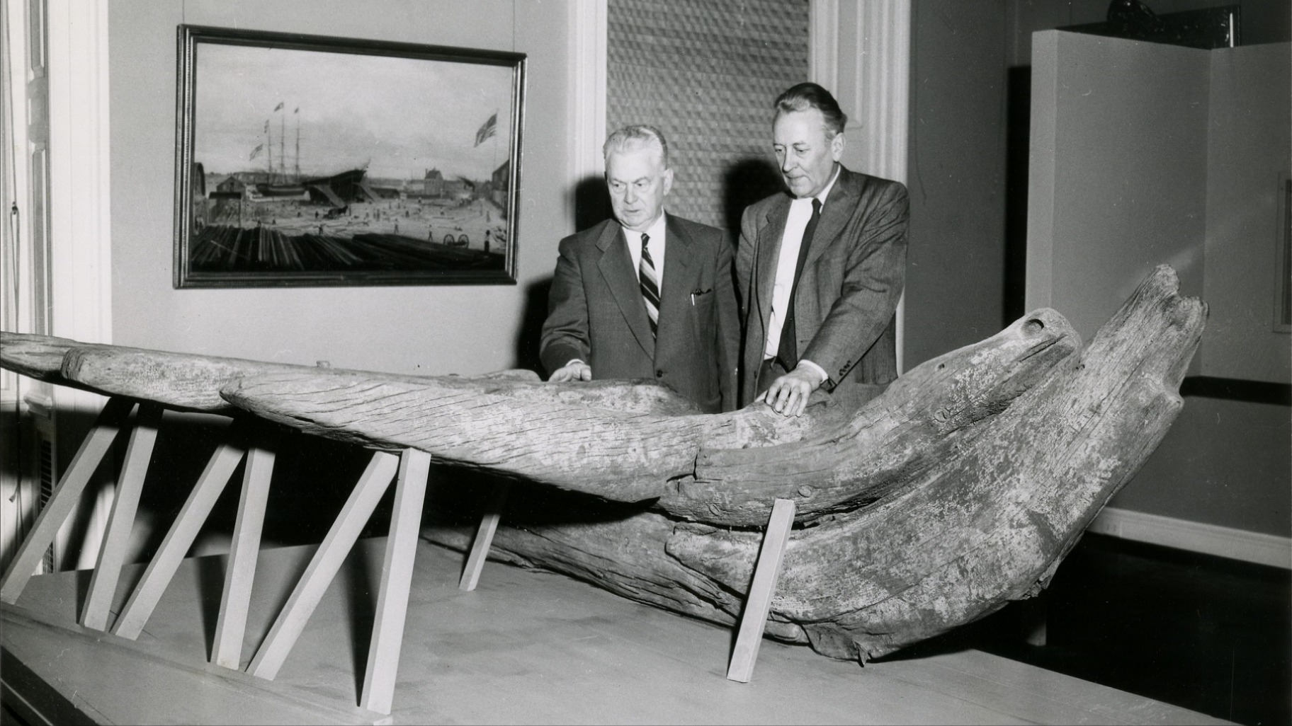 Museum of the City of New York curator William M. Williamson and historian James A. Kelly examine timbers, possibly from the Tyger